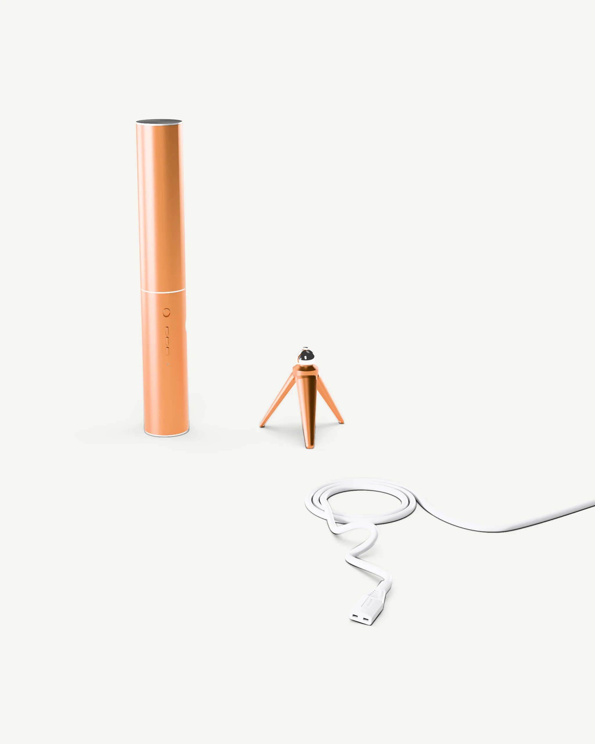 The gold dryer with its travel capsule connected, standing next to the folded tripod and the coiled cable.
